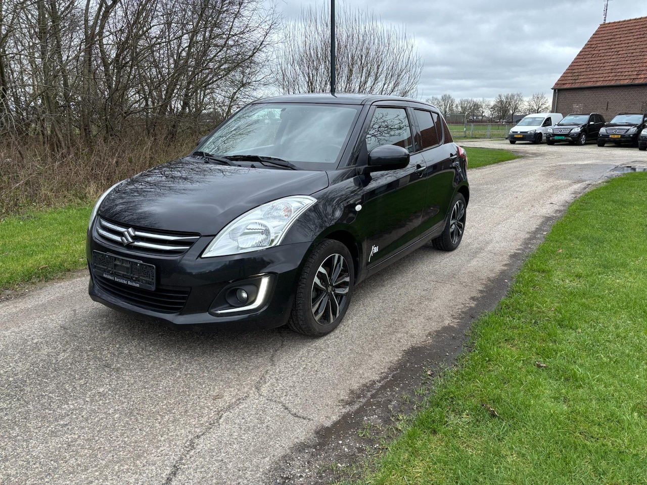 Suzuki Swift - 1.2 x-tra 6 maanden garantie alcantara / stoelverwarming / airco - AutoWereld.nl