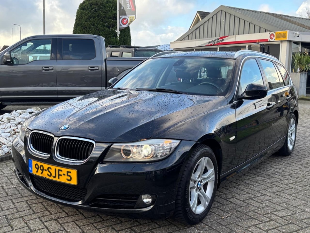 BMW 3-serie Touring - 318i Luxury Line 2011 Zwart Leer Xenon - AutoWereld.nl