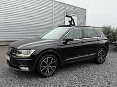 Volkswagen Tiguan - 1.4 TSI ACT Highline DSG Pano|Camera|Navi|ACC Zwart