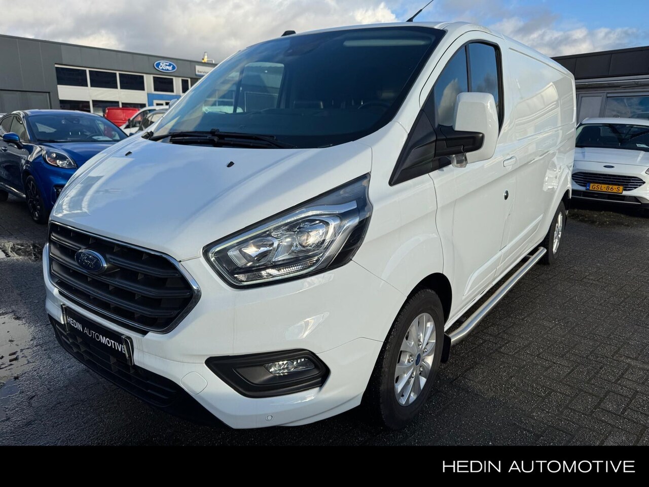 Ford Transit Custom - 300 2.0 TDCI L2H1 Limited Trekhaak | Nav | Stoelverwarming - AutoWereld.nl