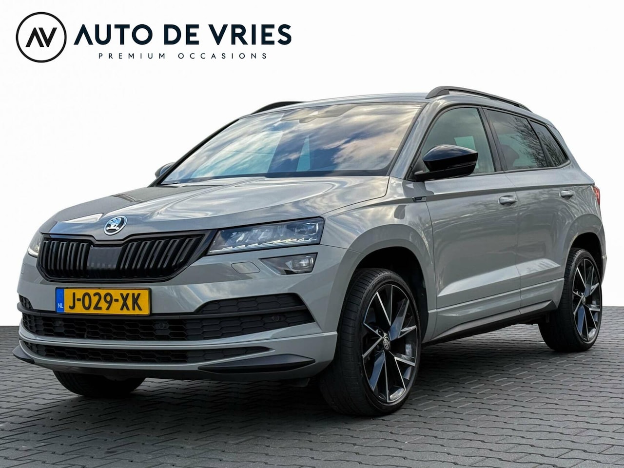 Skoda Karoq - 1.5 TSI ACT 150pk DSG Sportline Business | Full LED | Winterpakket | Sfeerverlichting | Ad - AutoWereld.nl