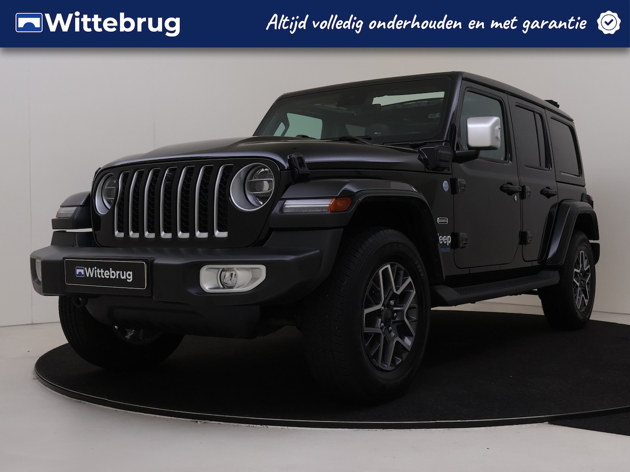 Jeep Wrangler Unlimited - 4xe 380PK Sahara Leder Interieur | 4 X 4 | Trekhaak | Parkeerhulp | Cabrio soft top FP - AutoWereld.nl