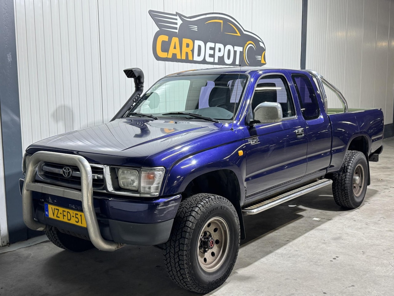 Toyota HiLux - 2.4 Xtra Cab UNIEK Zeer Netjes - AutoWereld.nl