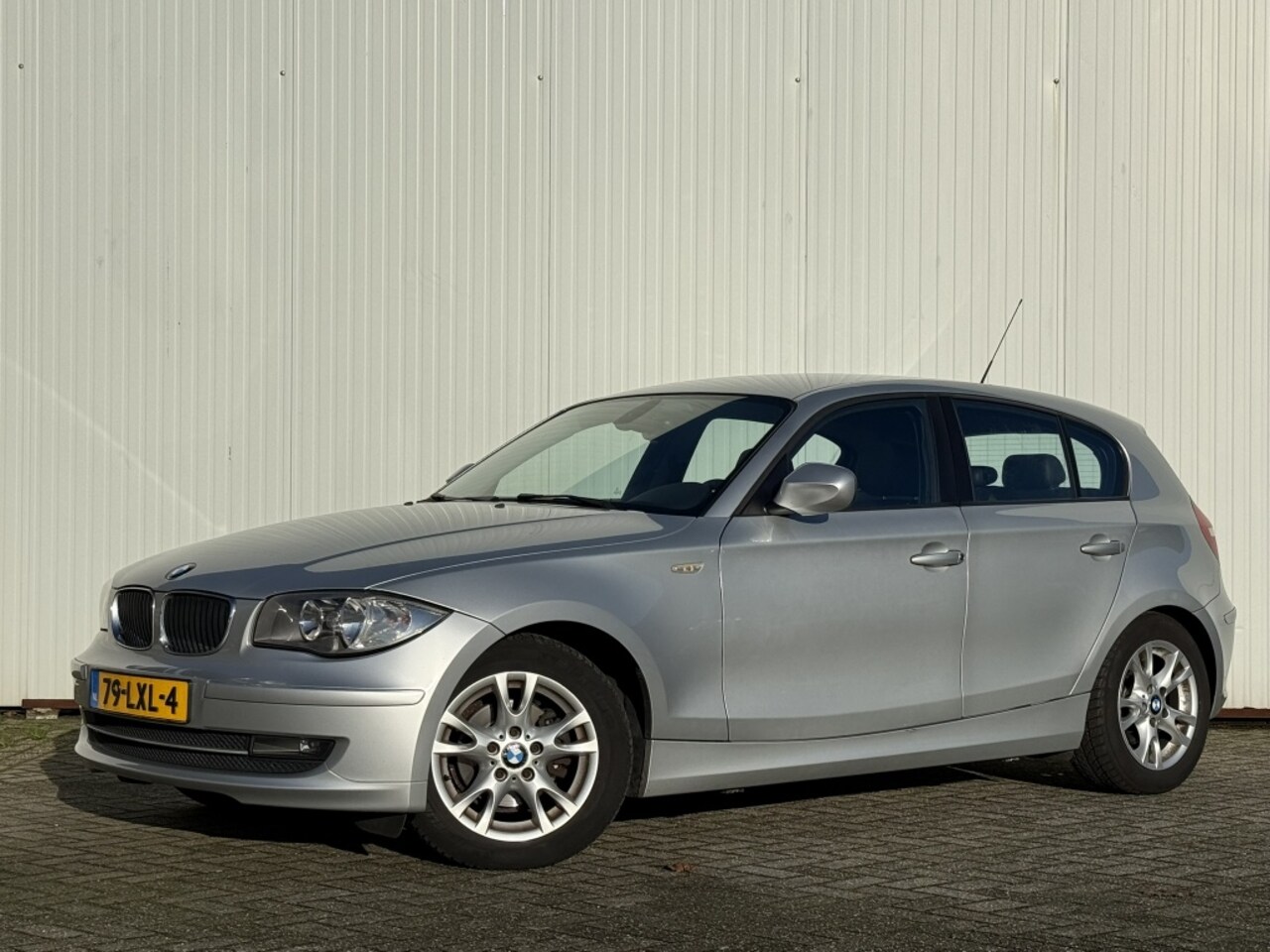 BMW 1-serie - 116i Business Line Origineel Nederland, Leder, Cruise control - AutoWereld.nl