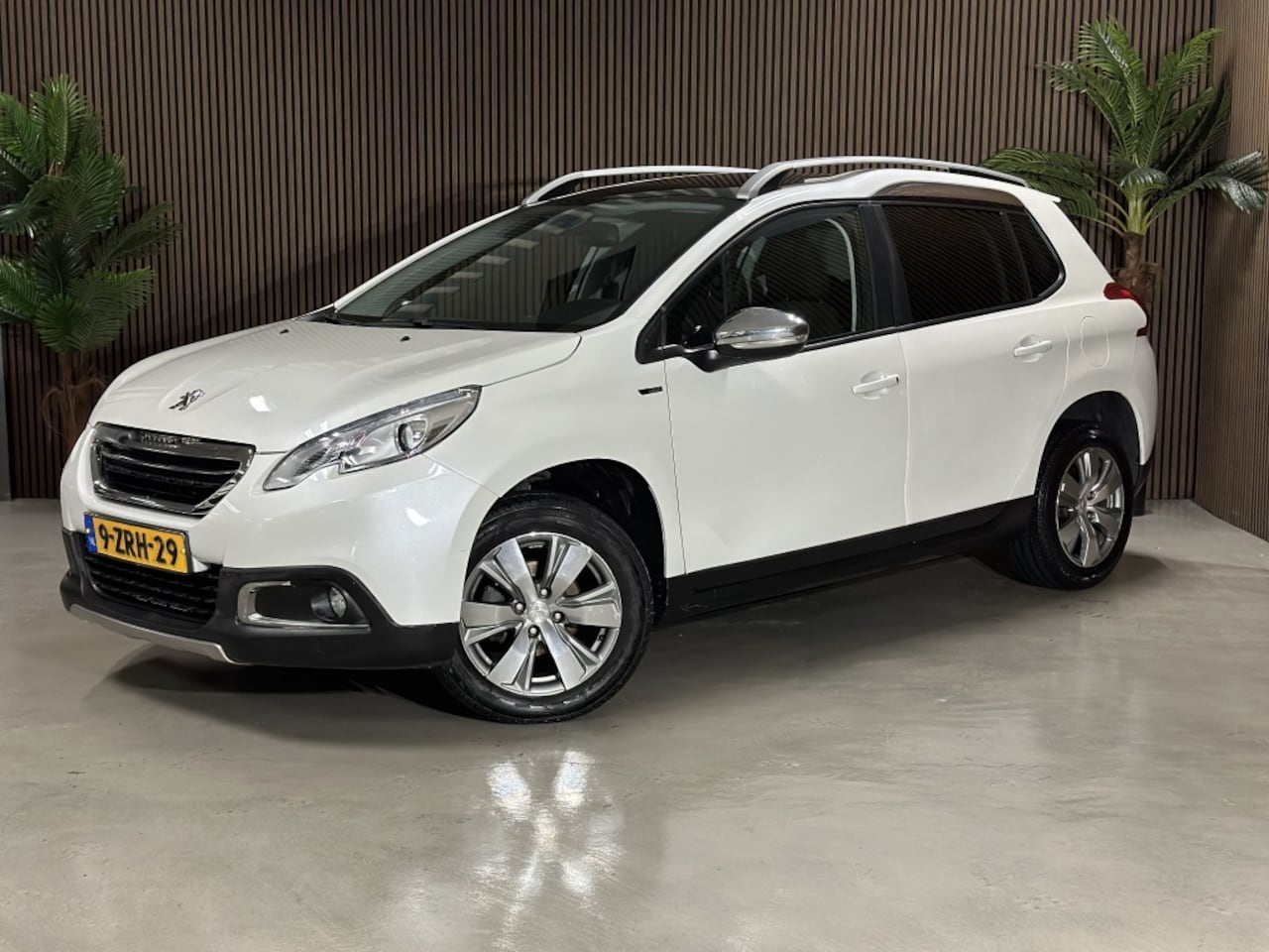 Peugeot 2008 - 1.2 PureTech Style 1.2 PureTech Style - AutoWereld.nl