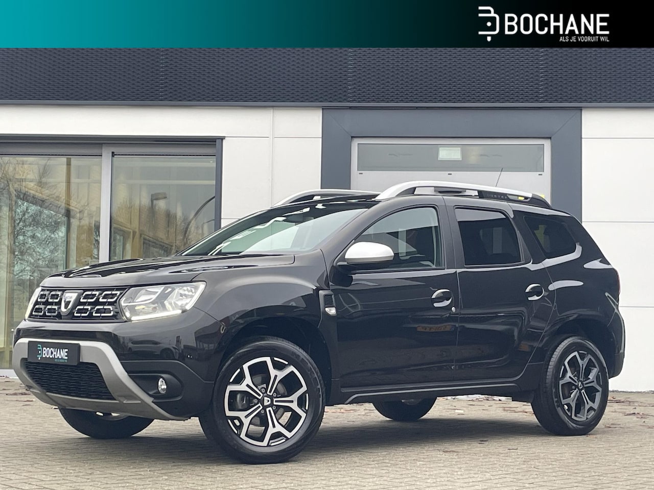 Dacia Duster - 1.2 TCe Prestige | Lederen bekleding | Cruise control | - AutoWereld.nl