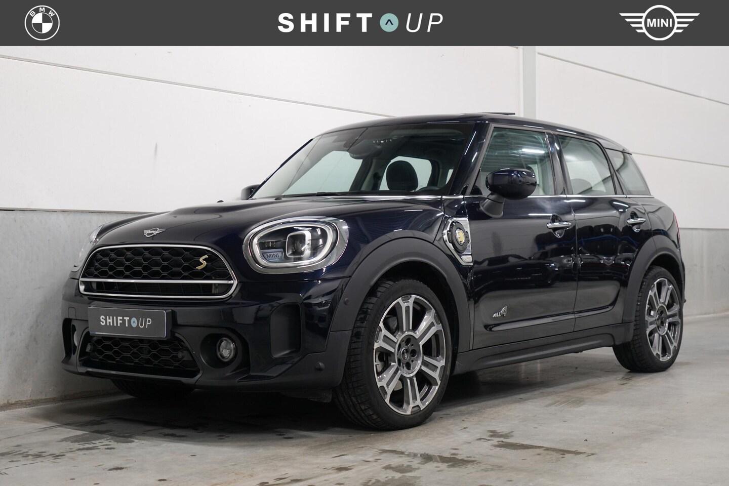 MINI Countryman - Mini 2.0 Cooper S E ALL4 Panoramadak | Harman Kardon | Head Up | Adapt. Cruise Control - AutoWereld.nl