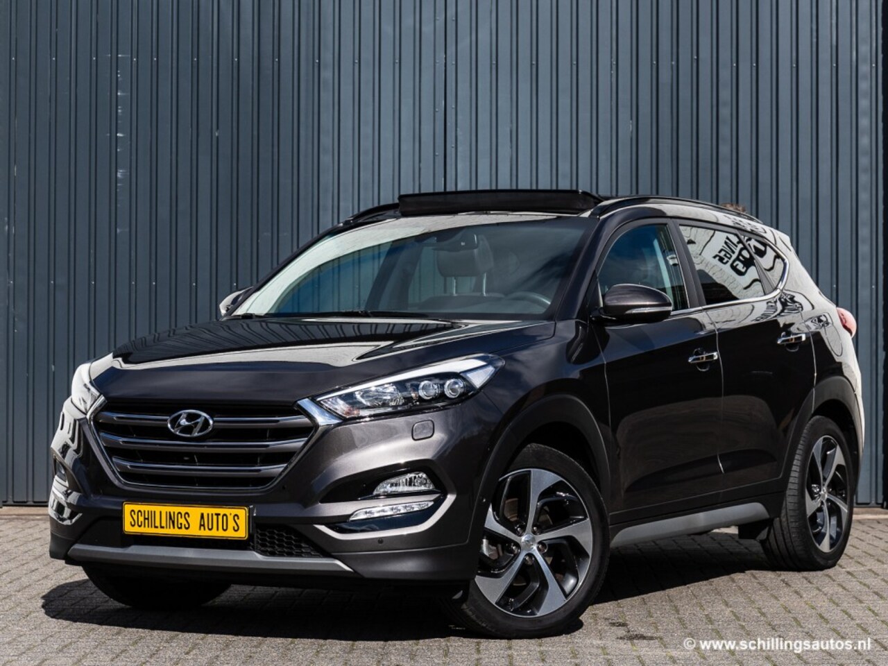 Hyundai Tucson - 1.6 T-GDI PREM. 4WD 170PK Automaat Navi Camera Panoramadak leer - AutoWereld.nl