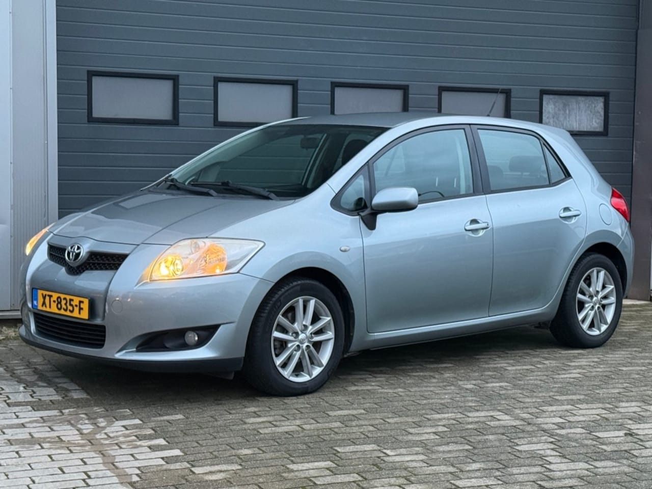 Toyota Auris - 1.3 Aspiration Airco Navi Trekhaak Rijklaar! - AutoWereld.nl