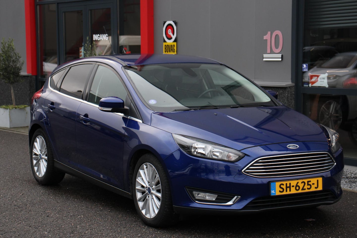 Ford Focus - 1.0 Titanium 102DKM, NAVI, CLIMA, KEYLESS - AutoWereld.nl