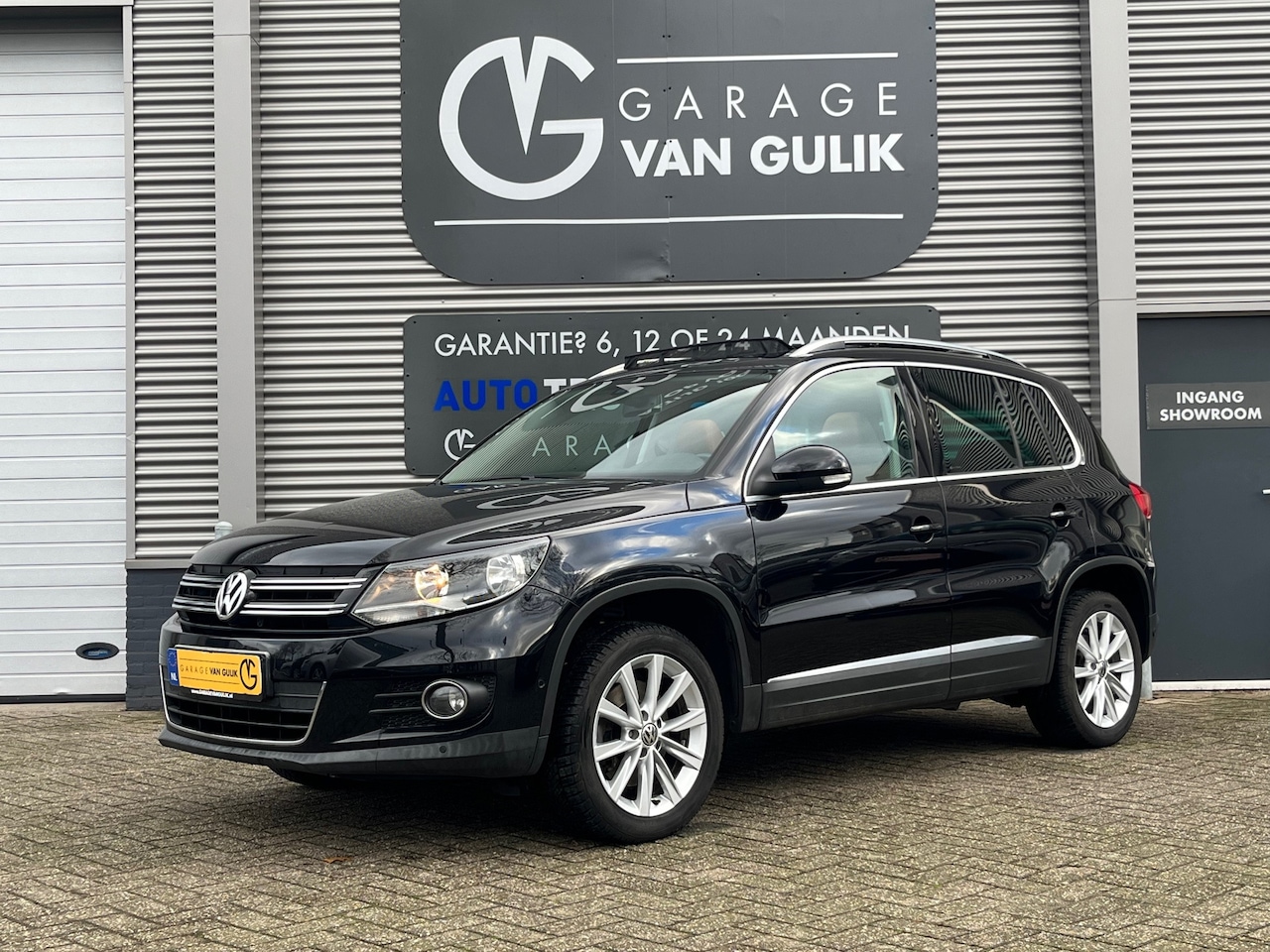 Volkswagen Tiguan - 1.4 TSI 160PK Sport&Style Clima,Cruise,Navi,Leder,Stoelverw.,Panoramadak,Aux,Isofix,Stuurb - AutoWereld.nl