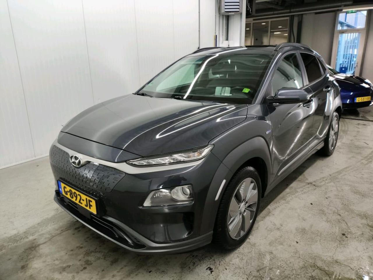 Hyundai Kona Electric - EV Premium 64kWh 204pk [ PANO+ACC+CAMERA+STOEL/STUURWIELVERWARMING+CARPLAY+BLIS ] - AutoWereld.nl