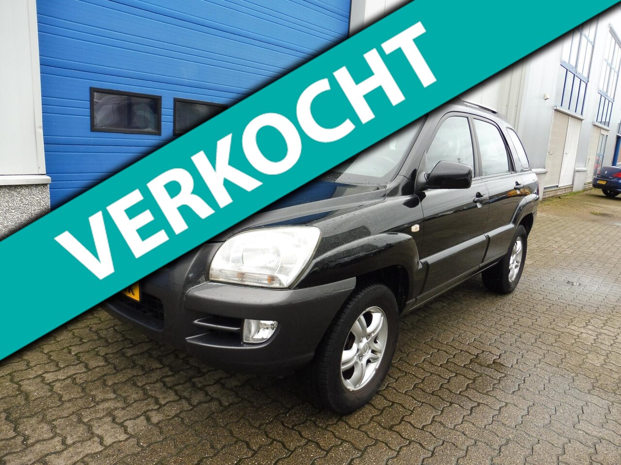 Kia Sportage - 2.0 CVVT X-ecutive 2.0 CVVT X-ecutive - AutoWereld.nl