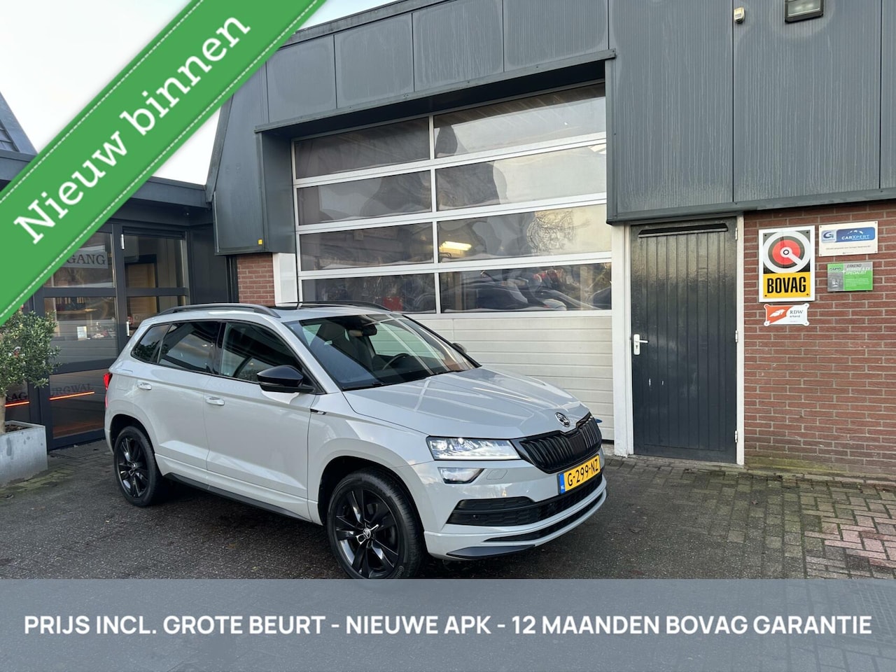 Skoda Karoq - 1.5 TSI ACT Sportline PANO/CAMERA *ALL-IN PRIJS* - AutoWereld.nl