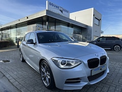 BMW 1-serie - M135i xDrive High Executive M-Performance int. en uitlaat | Carbon | Memory | Leer | Camer