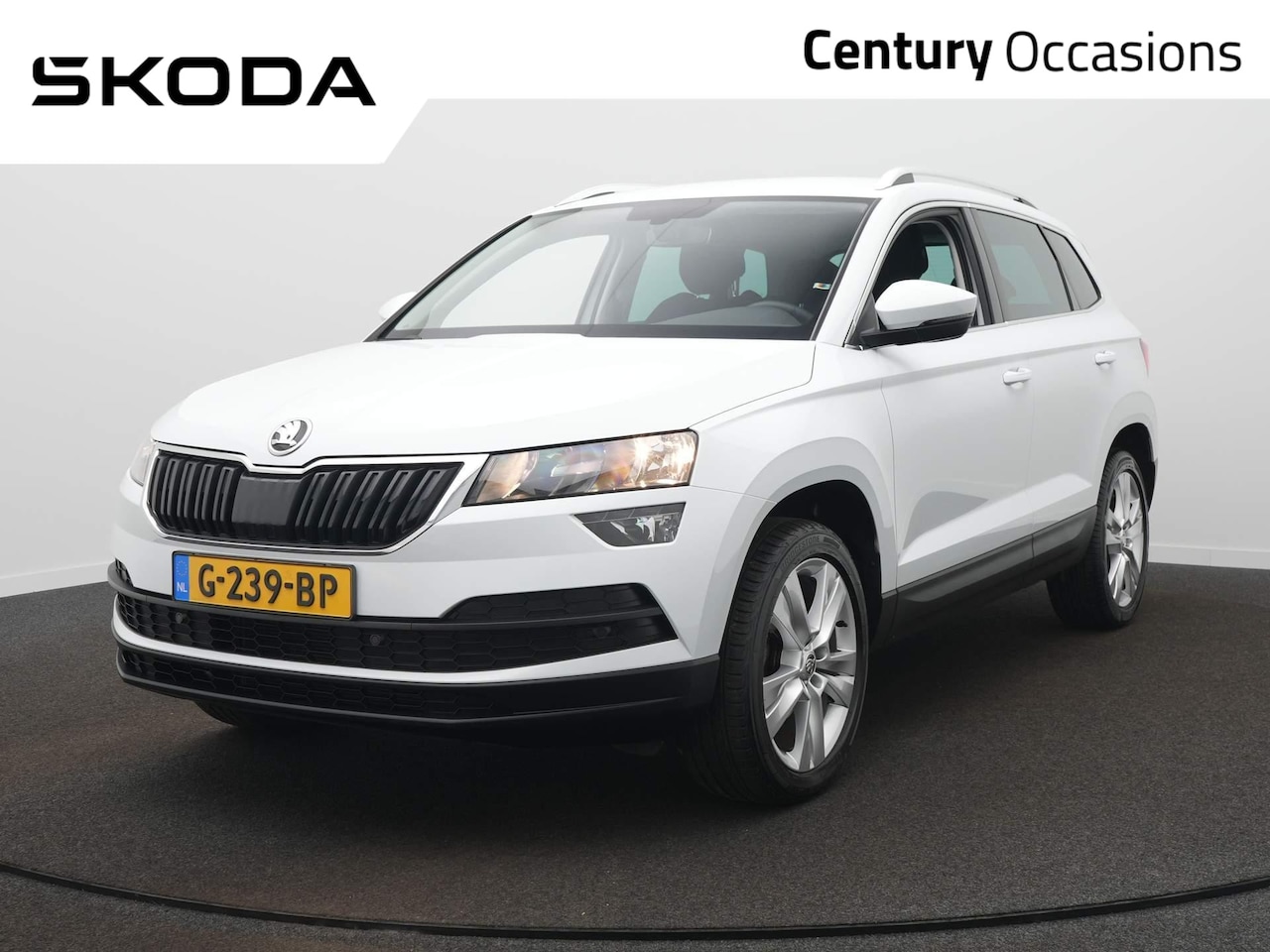 Skoda Karoq - 1.0 TSI Ambition Business / Sensoren / Navi / Trekhaak - AutoWereld.nl