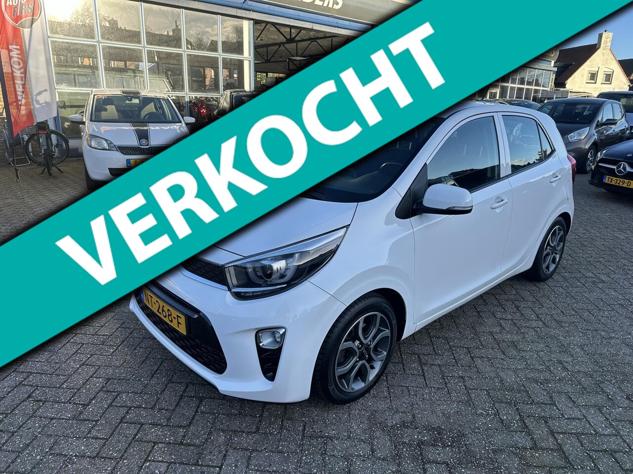 Kia Picanto - 1.0 CVVT First Edition I Clima I Camera I Cruise I Navi - AutoWereld.nl