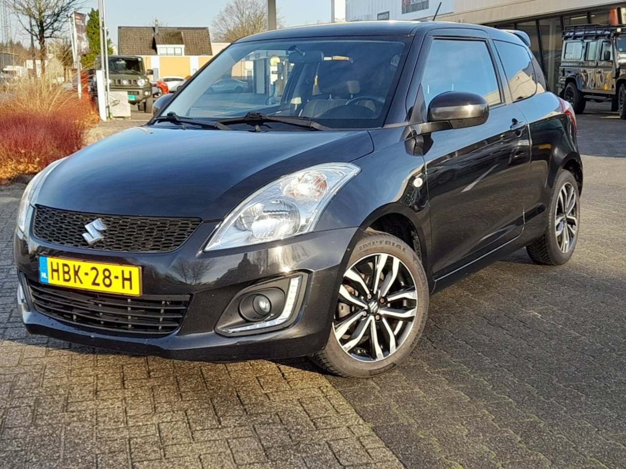 Suzuki Swift - 1.2 3 DEURS AIRCO NAVI CAMERA CRUISE SPOILER - AutoWereld.nl