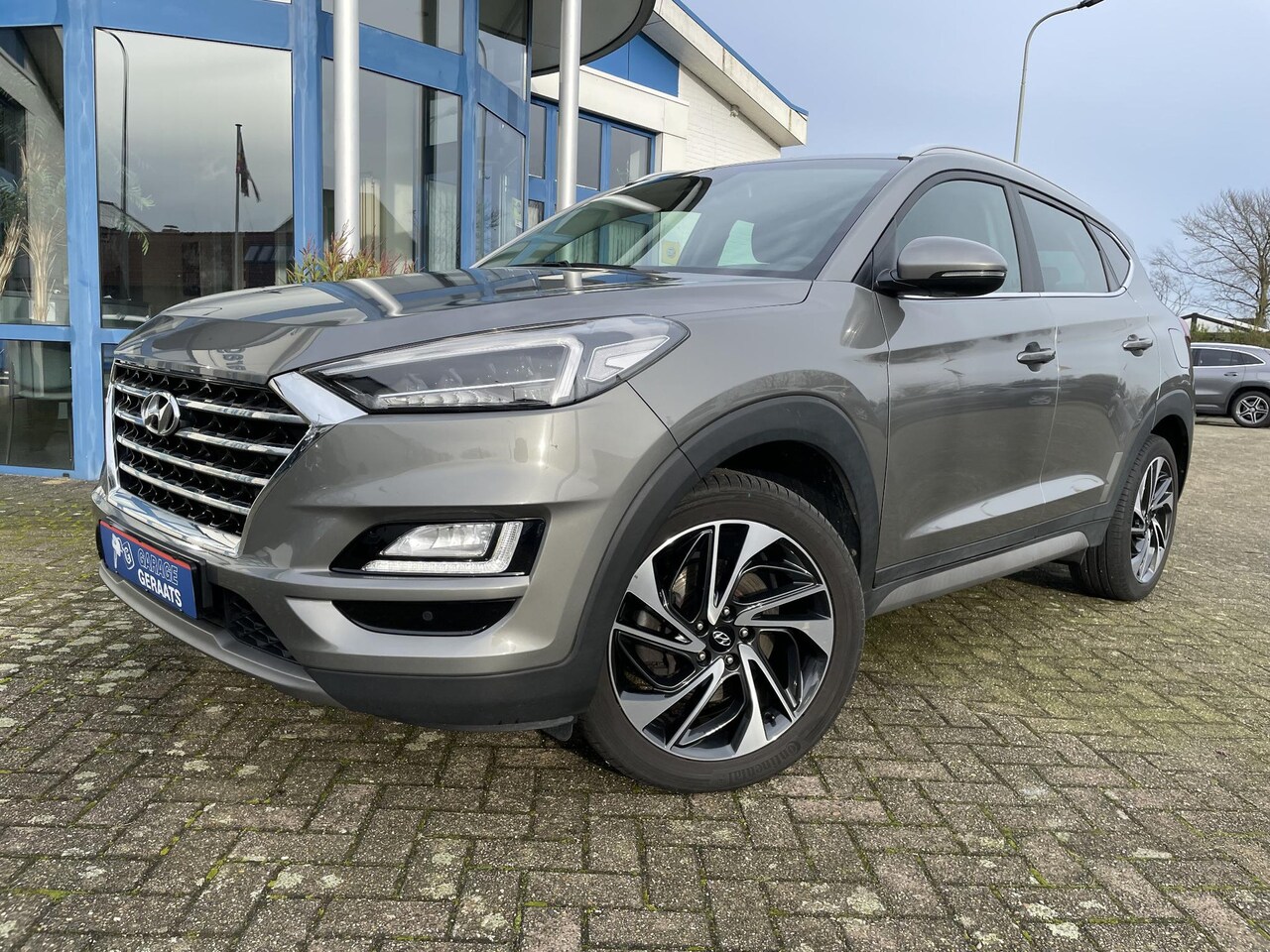 Hyundai Tucson - 1.6 T-GDI Premium | Keyless, Parkeersensoren V+A, 1e eigenaar, Dealer onderhouden, 1900 tr - AutoWereld.nl