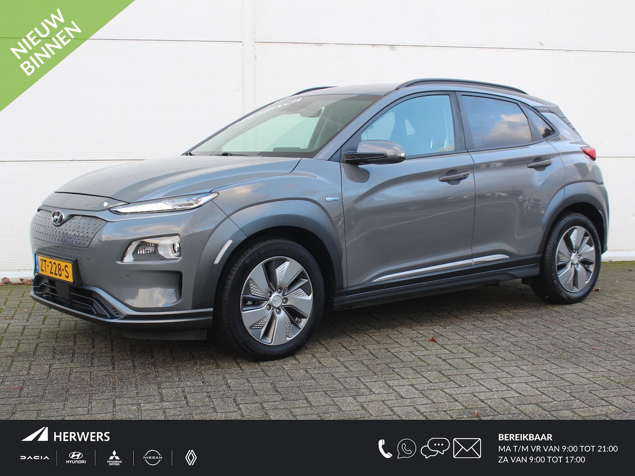 Hyundai Kona Electric - EV Premium 64 kWh / Lederen Bekleding / Navigatie + Apple Carplay/Android Auto / Keyless E - AutoWereld.nl