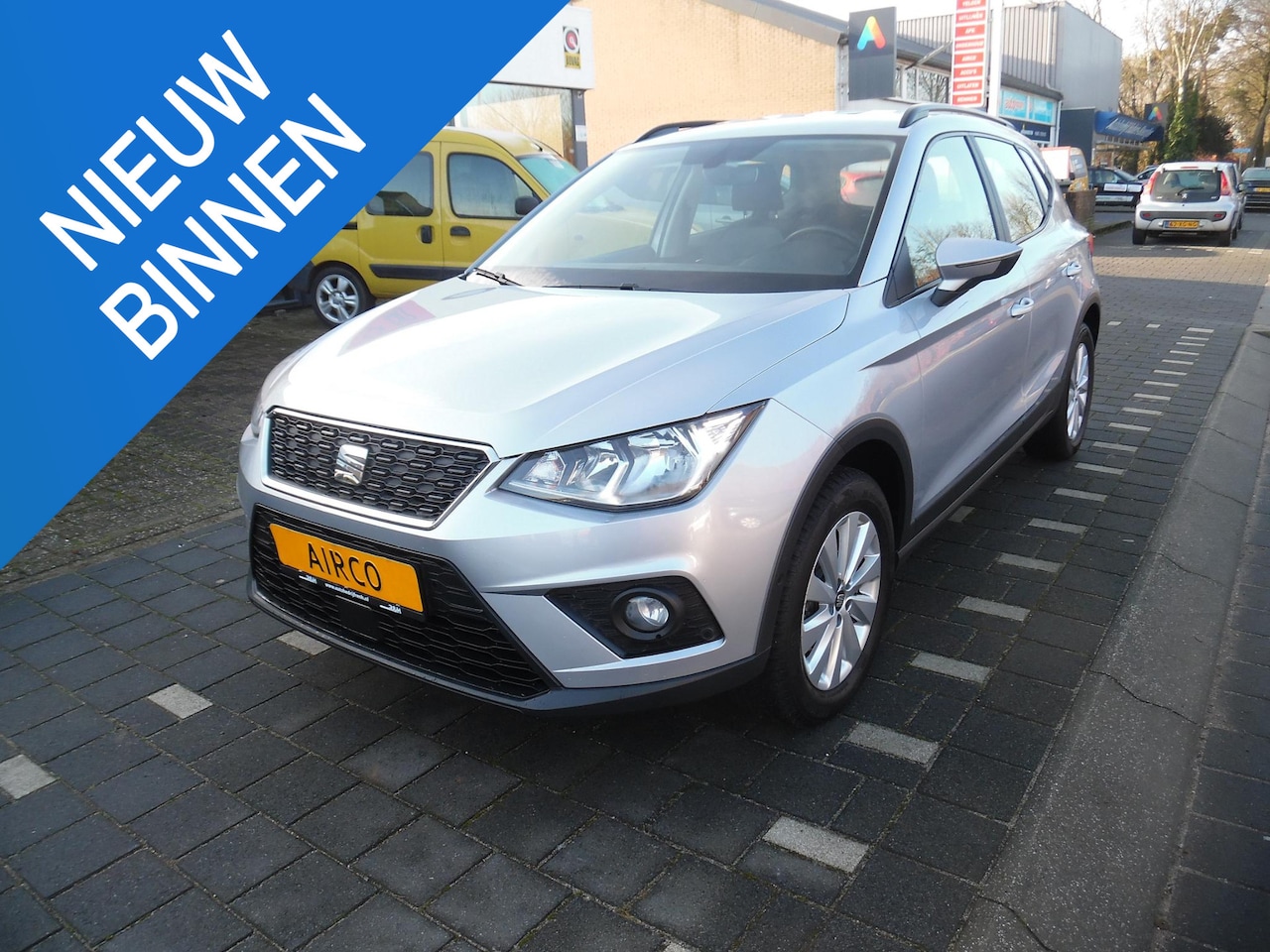 Seat Arona - 1.0 TSI Style Business Intense 5 deurs, airco, trekhaak, apple carplay, navigatie, pdc, cr - AutoWereld.nl