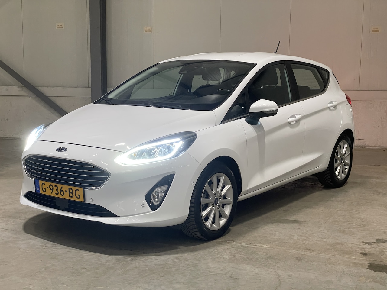 Ford Fiesta - 1.0 EcoBoost Titanium | Trekhaak | B&O | Carplay | Camera | Adapt Cruise Control | Verwarm - AutoWereld.nl