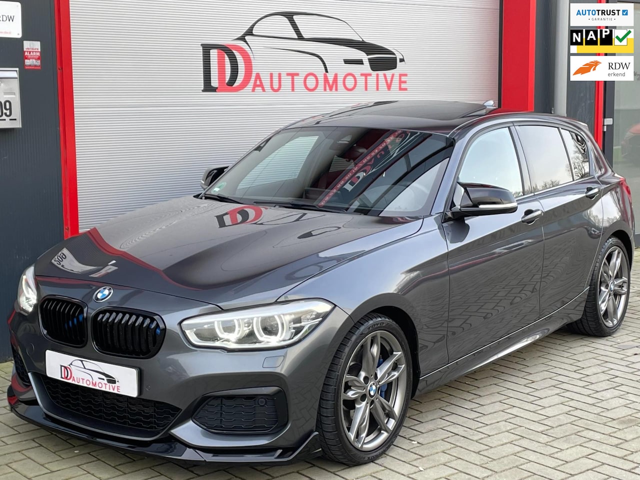 BMW 1-serie - M140i xDrive High Ex KEYLESS/CAMERA/DAK/H&K/LANE/MEMORY/MPERF/MAXTON/VIRTUAL - AutoWereld.nl