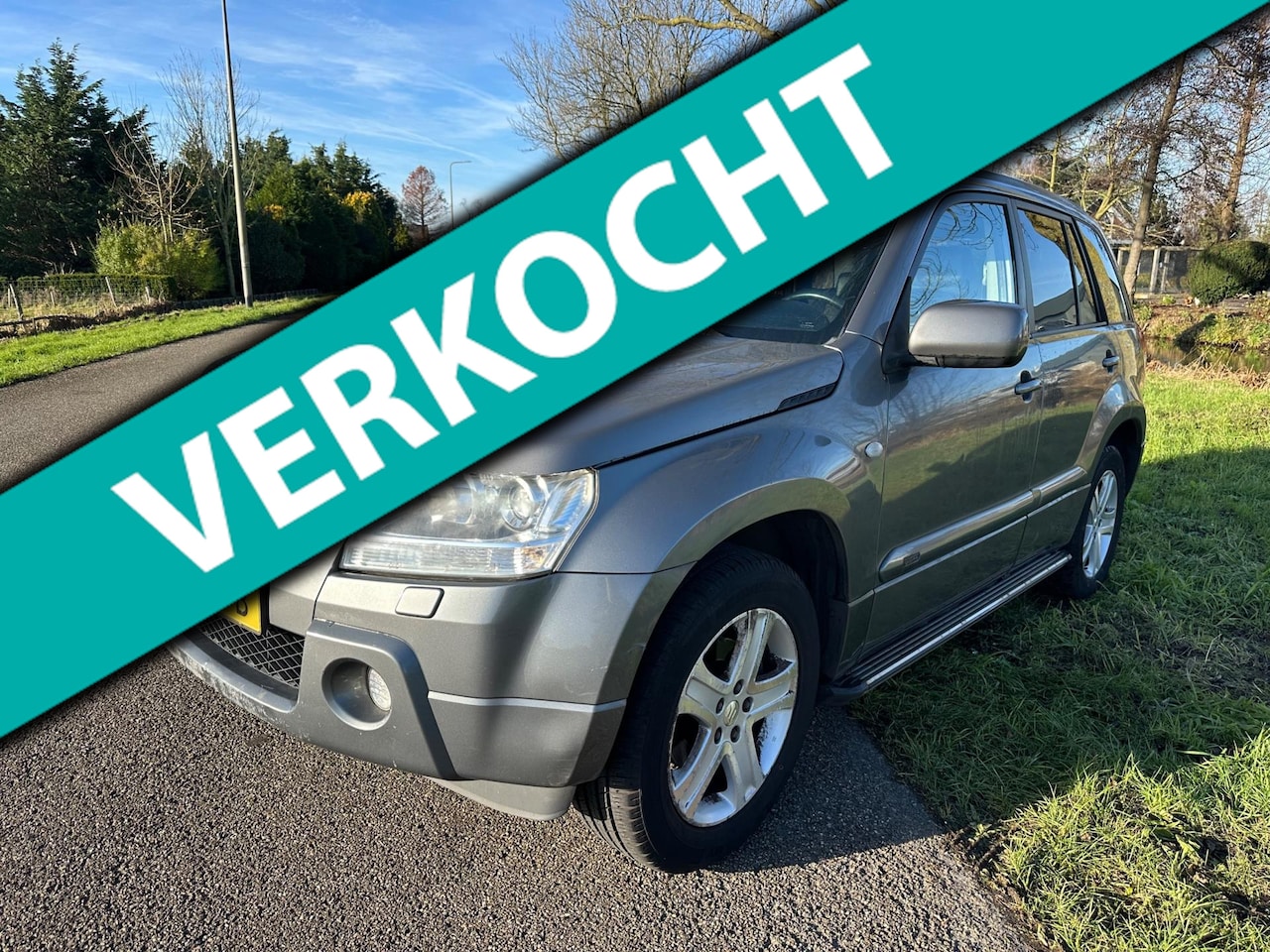 Suzuki Grand Vitara - 2.0-16V High Executive|4WD|trekhaak - AutoWereld.nl