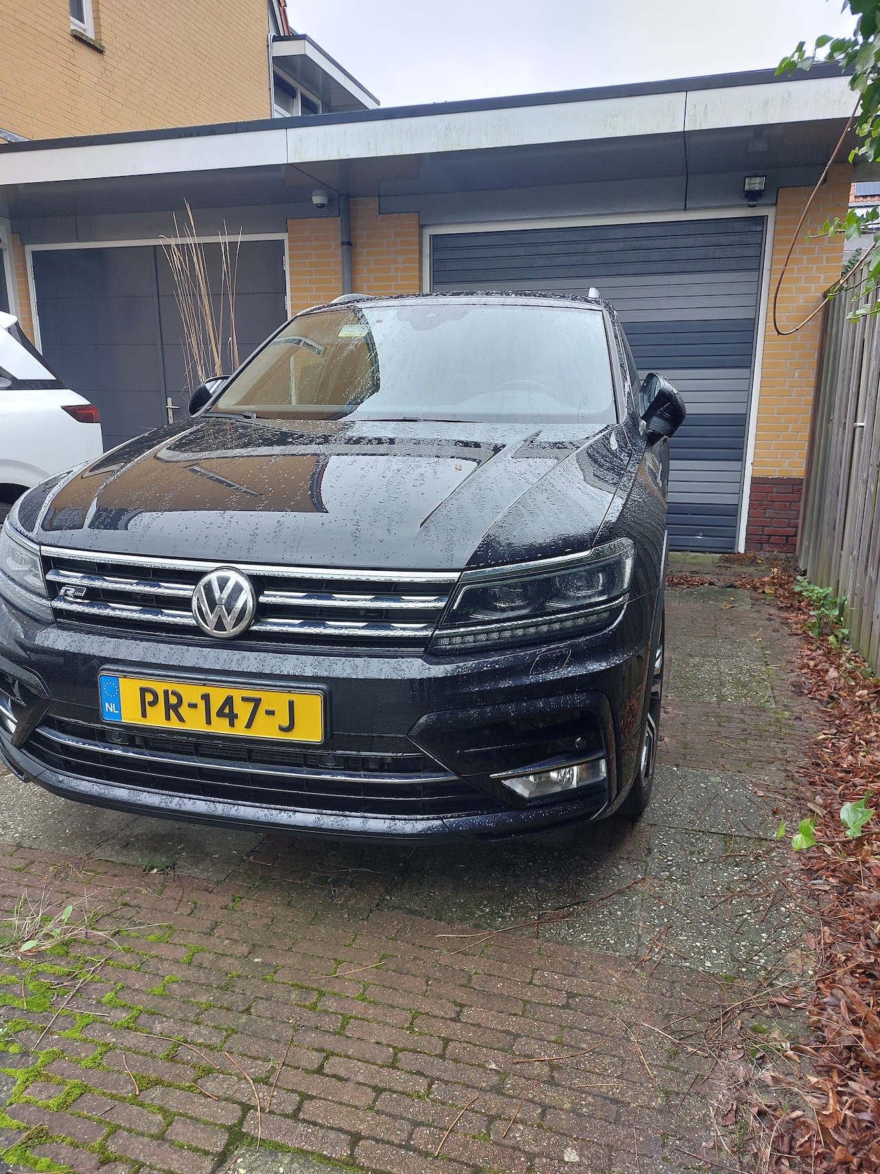 Volkswagen Tiguan - 2.0 TSI Highline 4Motion - AutoWereld.nl