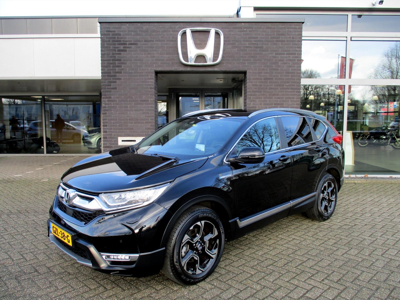 Honda CR-V - 2.0 HYBRID 184pk AWD E-CVT Executive + winterbanden - AutoWereld.nl