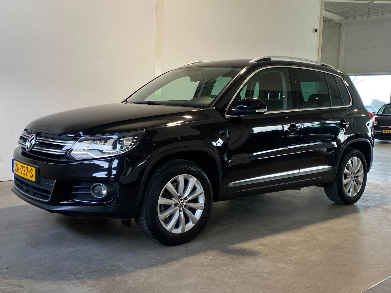 Volkswagen Tiguan - 1.4 TSI 122PK Trekhaak Xenon PDC - AutoWereld.nl