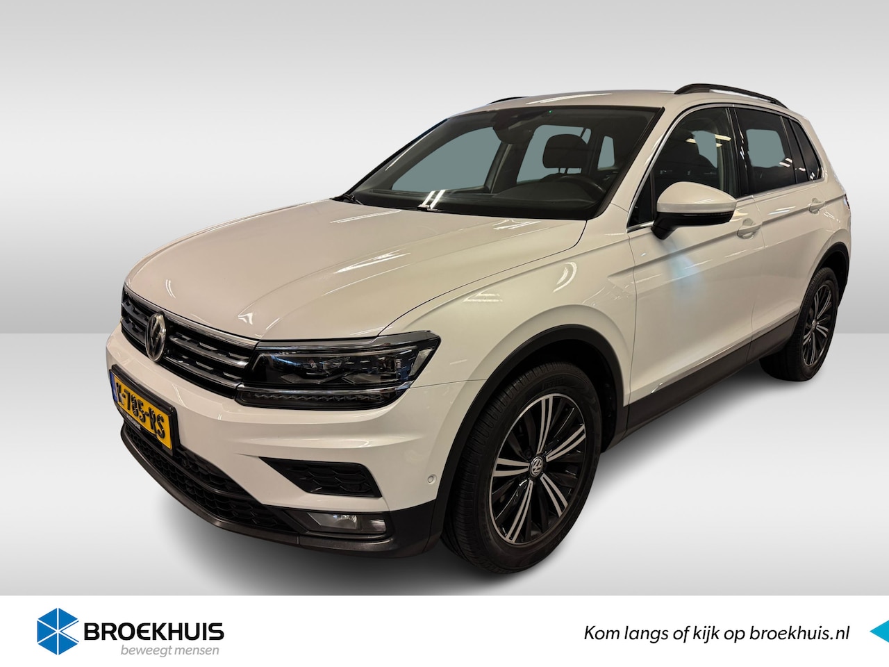 Volkswagen Tiguan - 1.4 TSI 150 pk DSG 4Motion Highline | Navi | Stoel- stuurverwarming - AutoWereld.nl