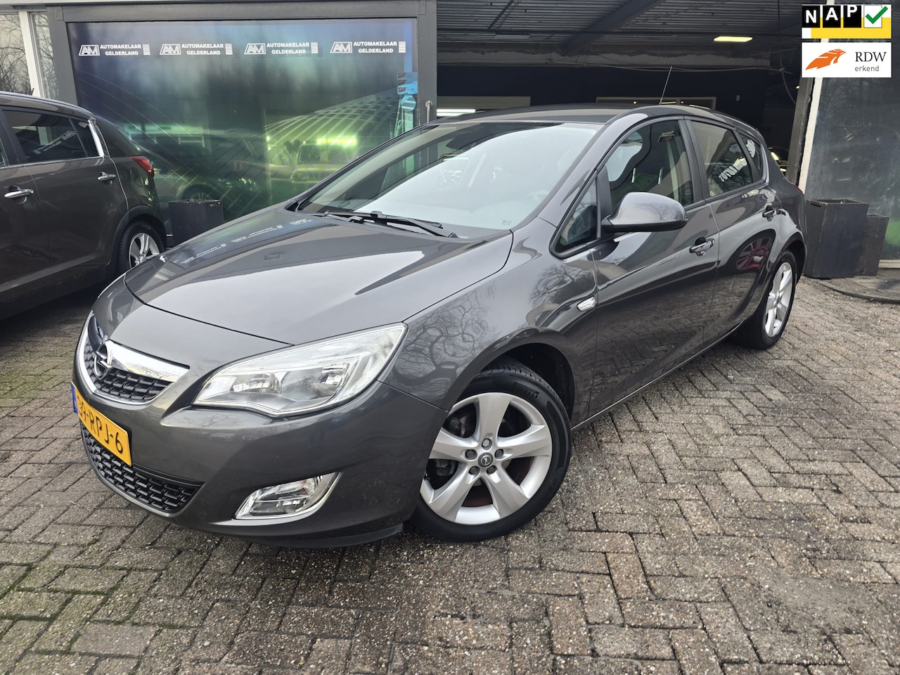 Opel Astra - 1.4 Turbo Edition 2E EIGENAAR | 12MND GARANTIE | AIRCO | CRUISE | LMV - AutoWereld.nl