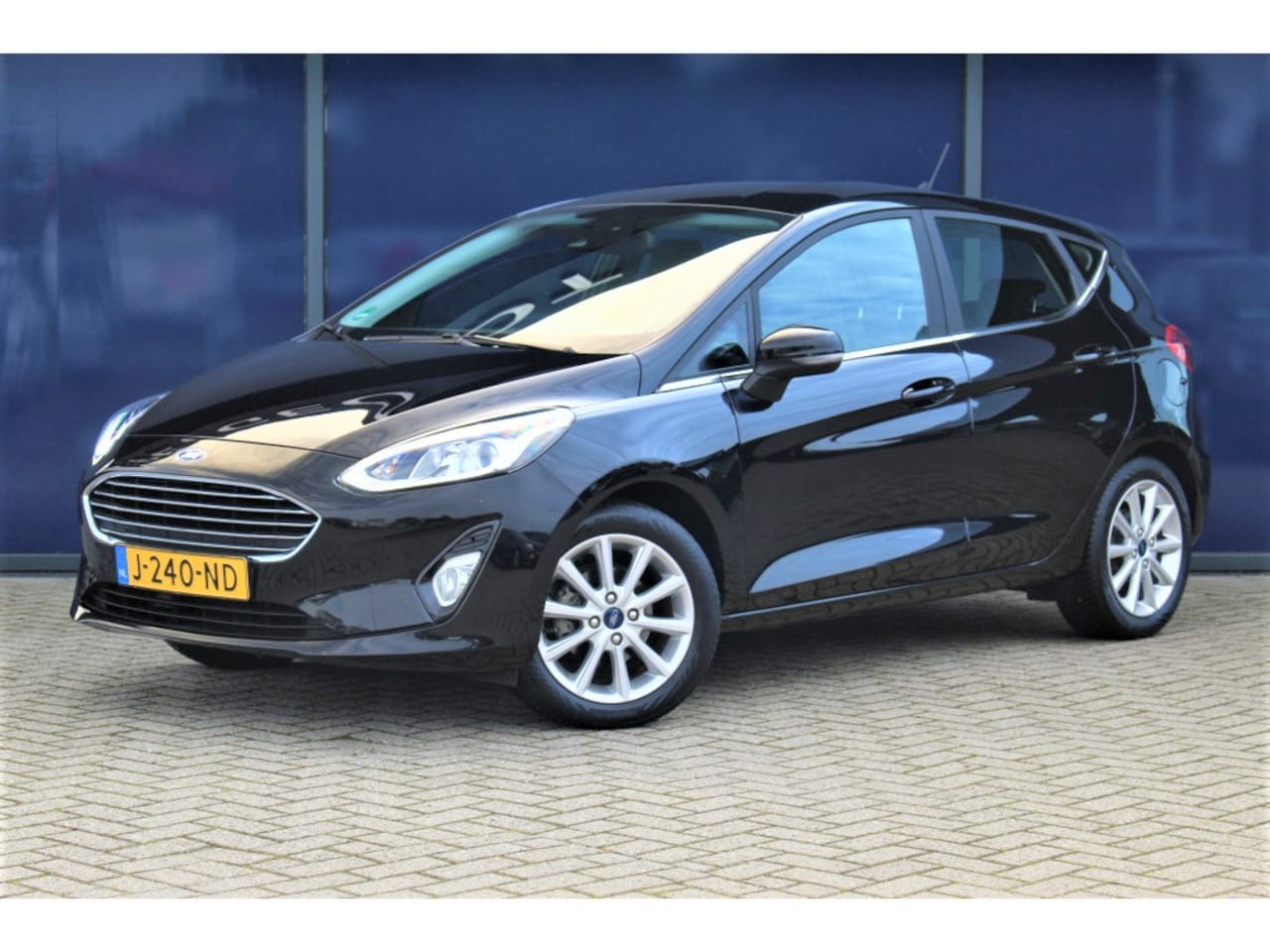 Ford Fiesta - 1.0 EcoBoost Titanium | Cruise & Climate C. | Carplay | Navi | Parkeerassistent | LMV | - AutoWereld.nl