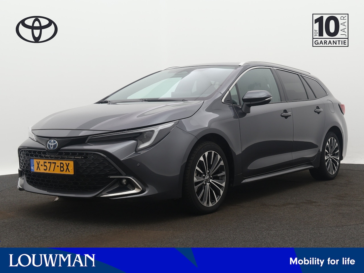 Toyota Corolla Touring Sports - 1.8 Hybrid First Edition | Camera | Parkeersensoren | LM velgen | Climate Control | Stoelv - AutoWereld.nl