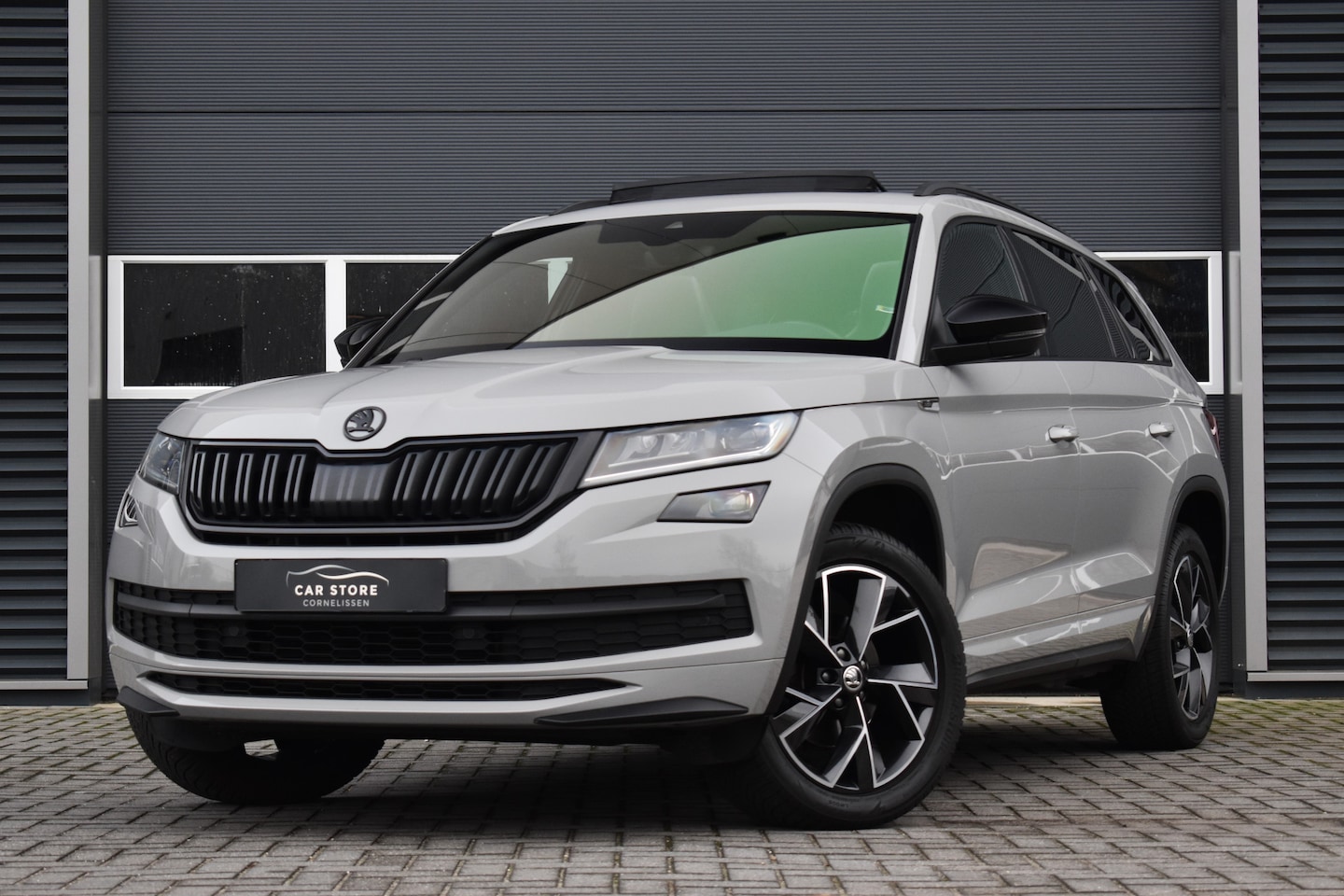 Skoda Kodiaq - 1.5 TSI SPORTLINE / PANO / VIRTUAL / MEMORY / CANTON / SFEERVERLICHTING / CAMERA / LED / T - AutoWereld.nl