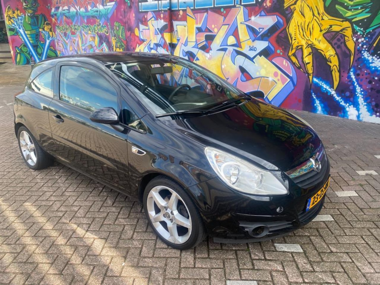 Opel Corsa - 1.2-16V Enjoy airco sport velgen stereo rijd goed sportive uitstraling bouwjaar 2008 met 1 - AutoWereld.nl