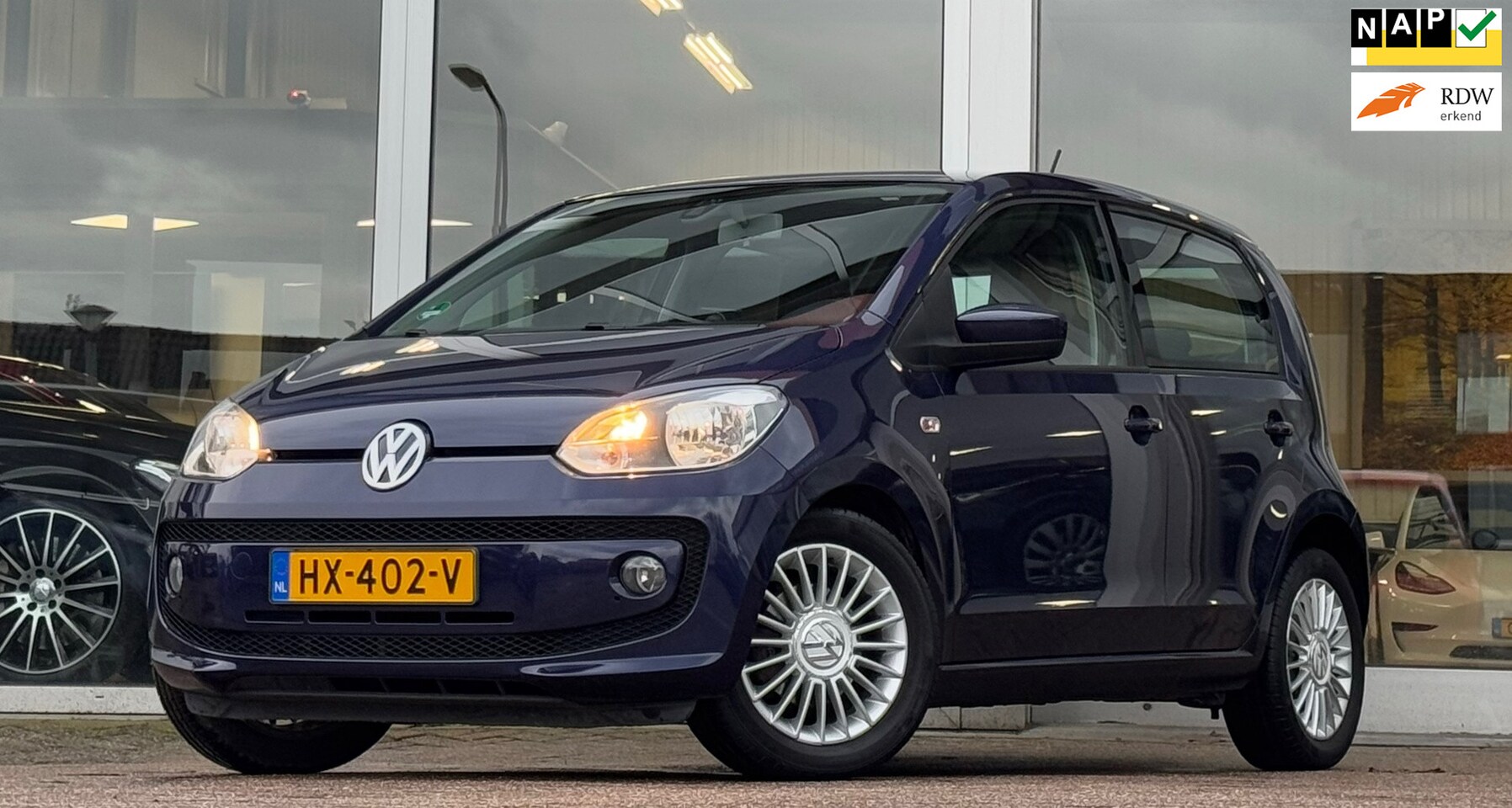 Volkswagen Up! - 1.0i high up! BlueMotion LM velgen Navi Airco Mooi! - AutoWereld.nl