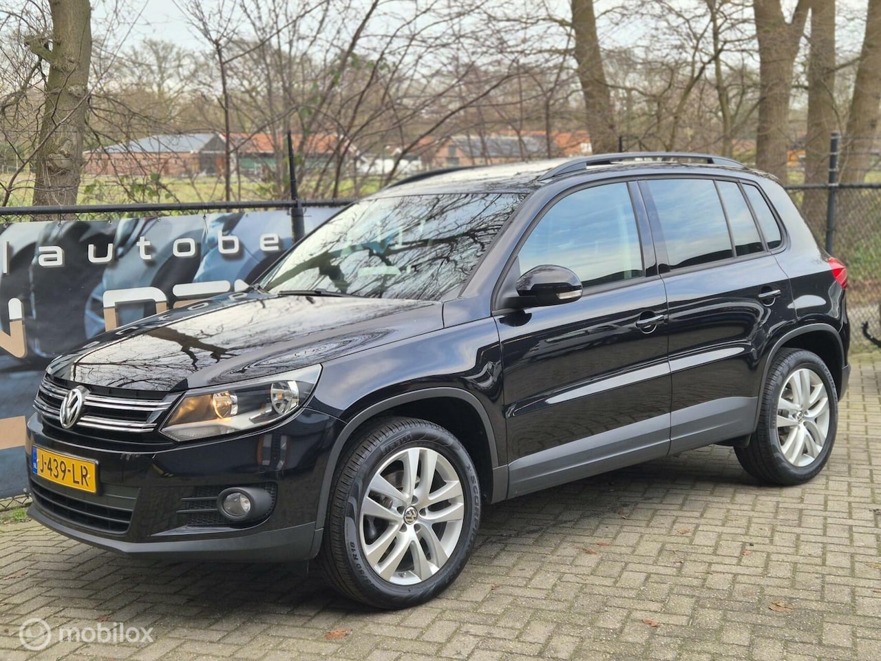 Volkswagen Tiguan - 1.4 TSI Sport&Style | PANO DAK | AIRCO | 18'' | PDC | NAVI | - AutoWereld.nl