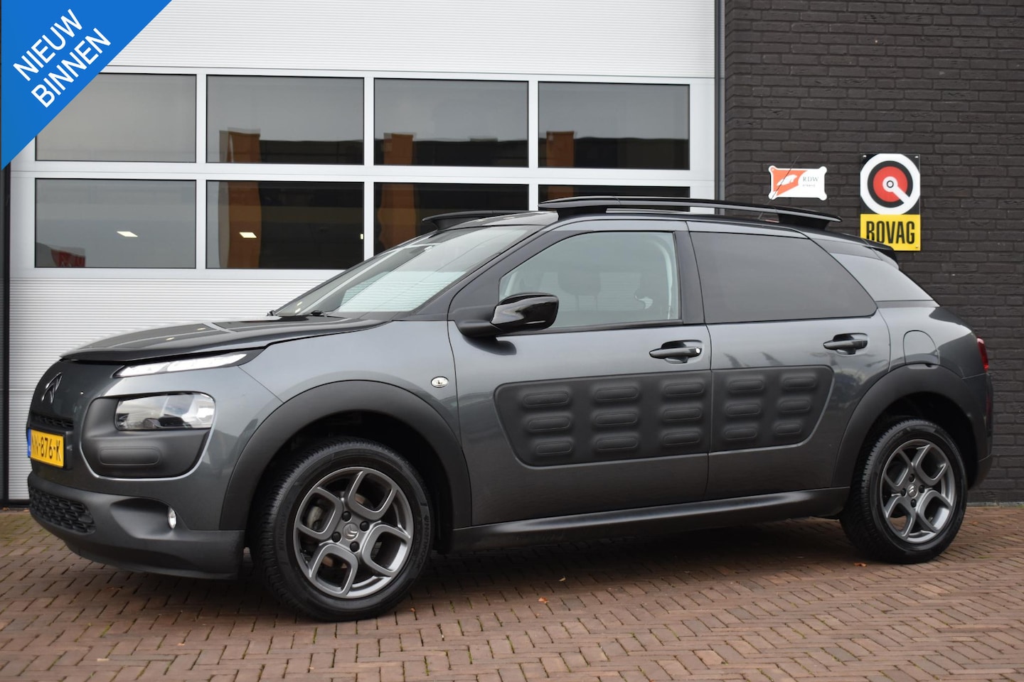 Citroën C4 Cactus - 1.2 PureTech 82PK Shine | Navi | PDC | 97.229KM | Incl. Garantie - AutoWereld.nl