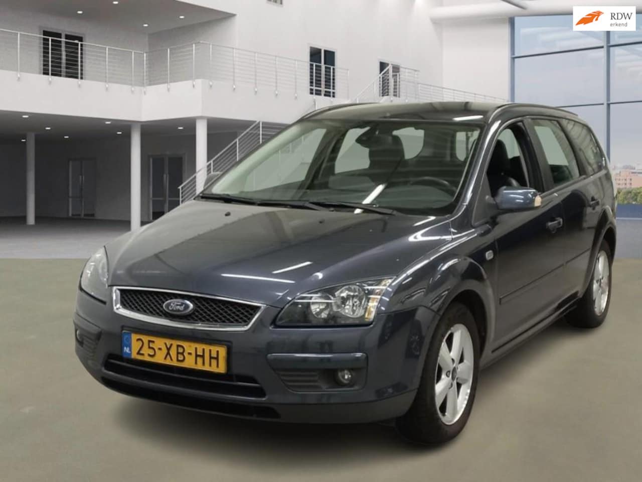 Ford Focus Wagon - 2.0-16V Titanium LEDER CRUISE TREKHAAK 2 X SLEUTELS - AutoWereld.nl