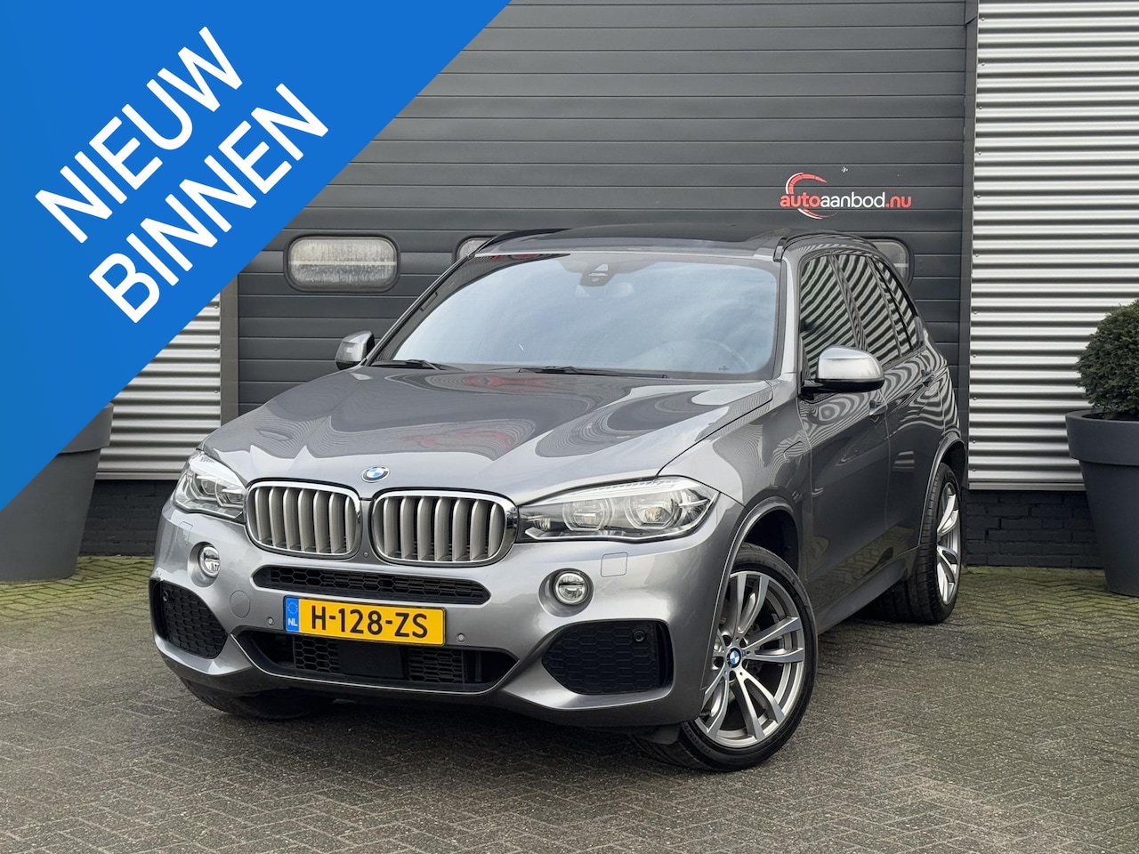 BMW X5 - xDrive40e iPerformance High Executive | Panoramadak | Camera | Bang & Olufsen | DAB | 20 I - AutoWereld.nl