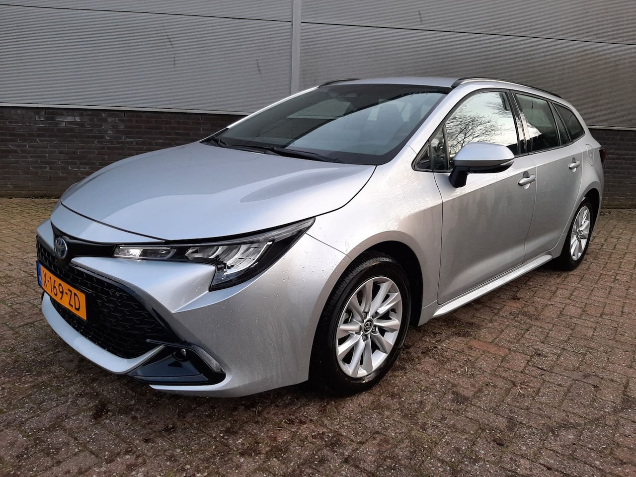 Toyota Corolla Touring Sports - Hybrid 140 Active - AutoWereld.nl