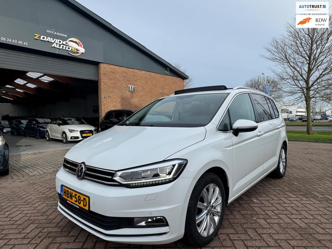 Volkswagen Touran - 1.4 TSI Highline Business R 7p Pano, Camera, Stoelmassage, vol optie - AutoWereld.nl