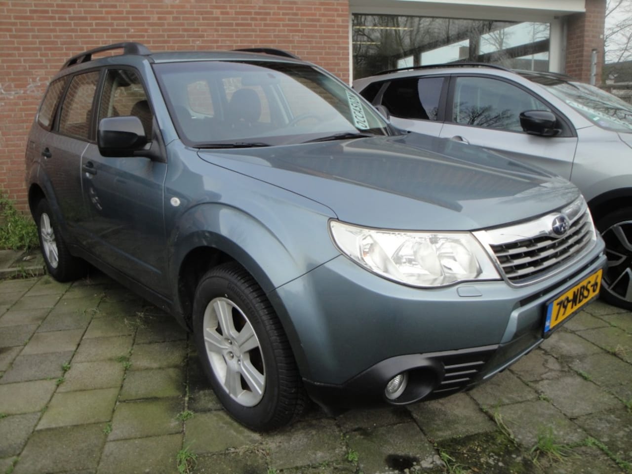 Subaru Forester - 2.0 AWD Intro (lage KM-st.) met Cl.- en Cr.-contr., Trekh., LM-ve - AutoWereld.nl