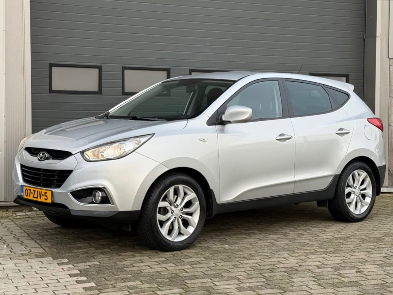 Hyundai ix35 - 1.6 GDI 135PK Dynamic Navi Cruise Trekhaak Dealeroh! - AutoWereld.nl