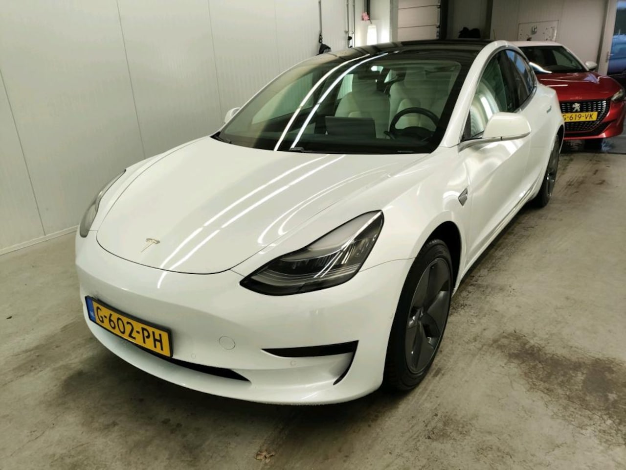 Tesla Model 3 - Standard RWD Plus [ WIT LEDER+AUTOPILOT+60 kWh+PREMIUM AUDIO ] - AutoWereld.nl