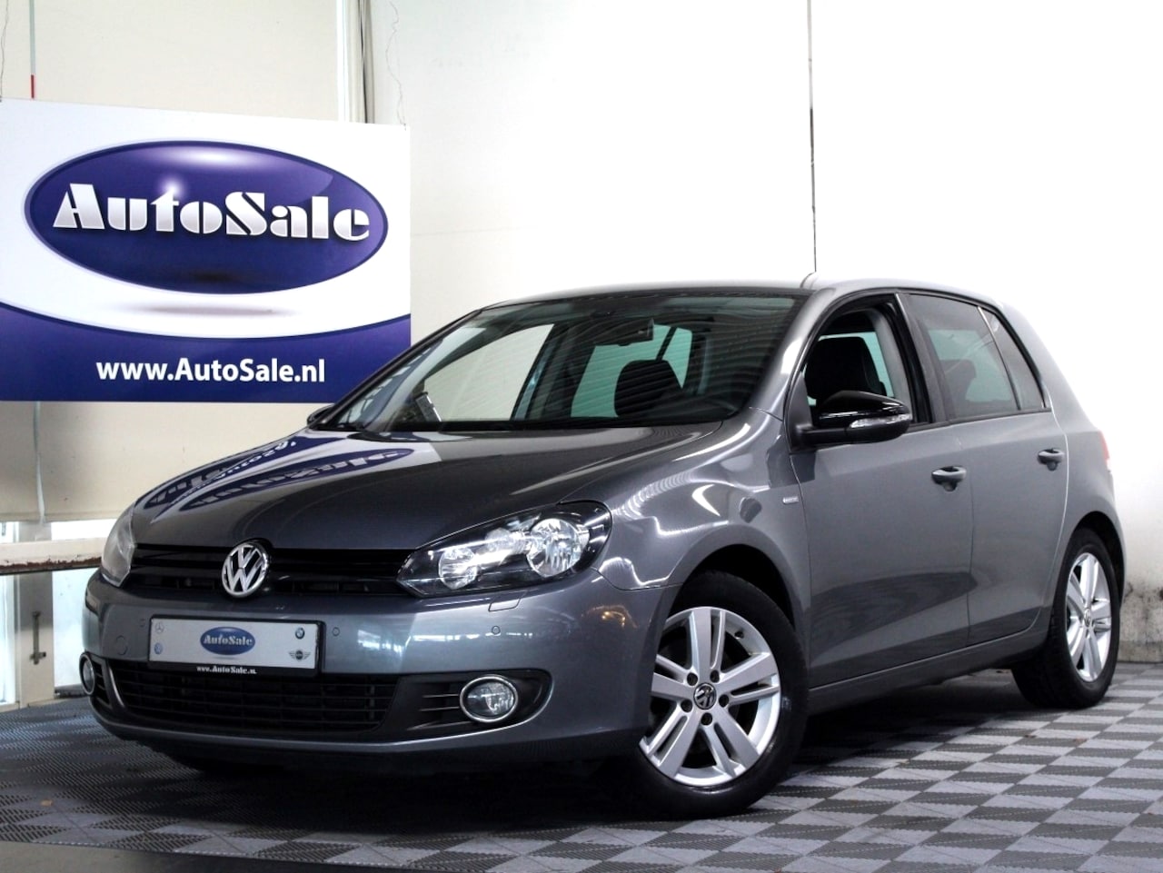 Volkswagen Golf - 1.4 TSI Highline 3eEIG NAVI BT PDC STOELVW ECC '12 - AutoWereld.nl