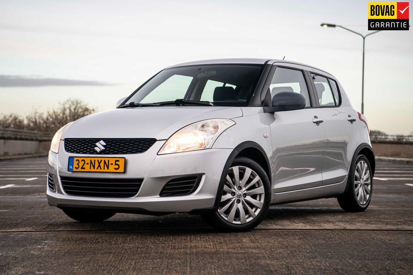 Suzuki Swift - 1.2 Comfort EASSS | Airco | Stoelverwarming | Radio/CD-Speler | Centrale Deurvergrendeling - AutoWereld.nl