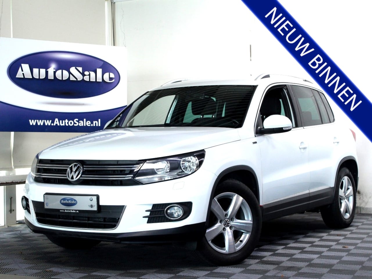 Volkswagen Tiguan - 1.4 TSI DSG Sport&Style 2eEIG NAV BT CAM STOELVW ECC '15 - AutoWereld.nl